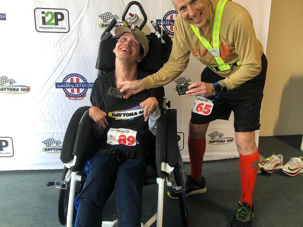 He pushed the wheelchair of disabled children and ran 45 marathons